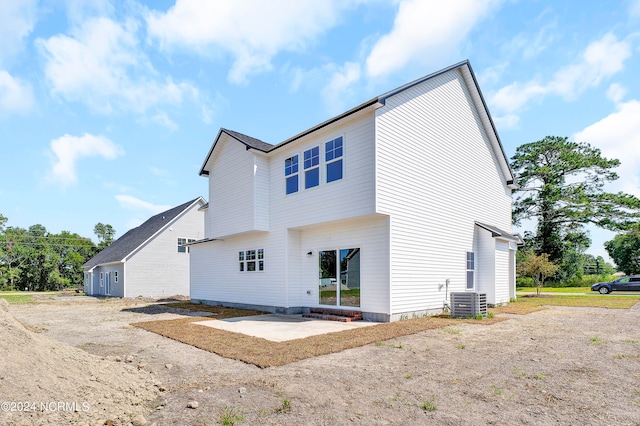 back of house featuring a patio area and central AC