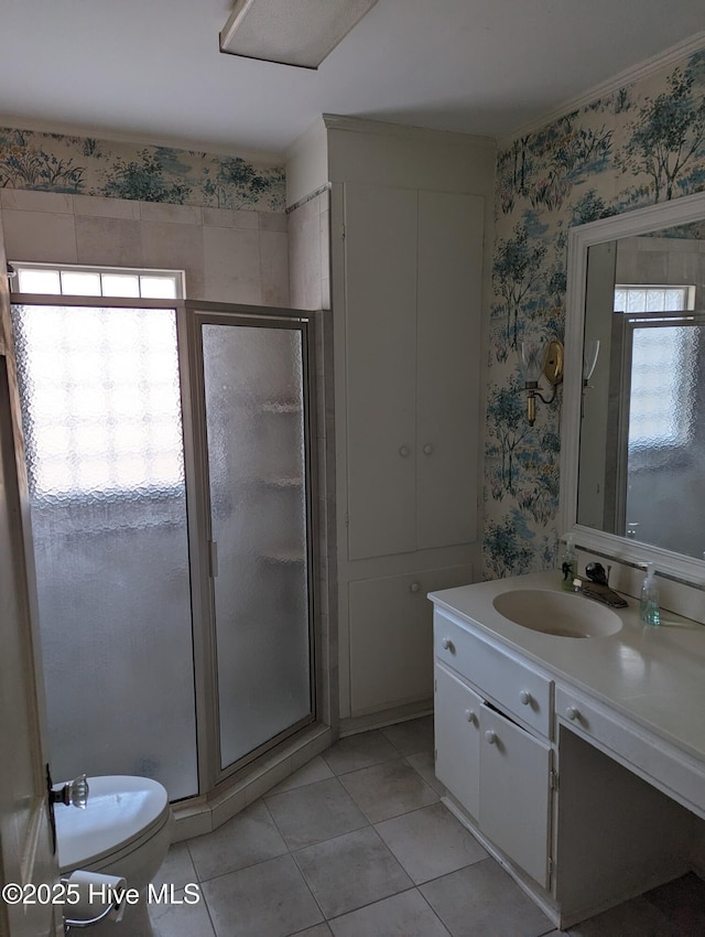 bathroom with a healthy amount of sunlight, a shower stall, and wallpapered walls