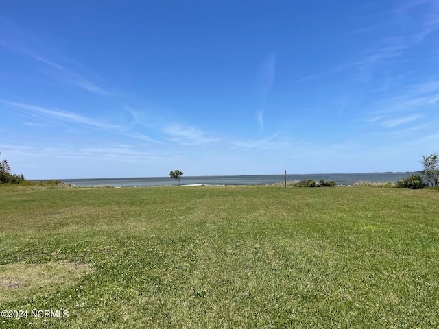 view of yard with a water view