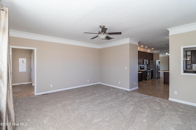 unfurnished living room with dark colored carpet, ceiling fan, crown molding, and a textured ceiling