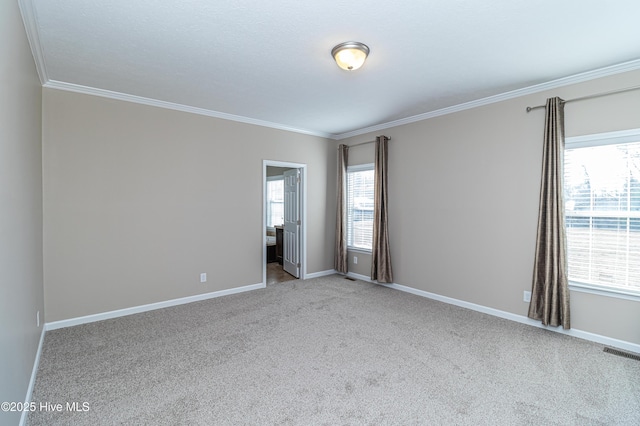 unfurnished room featuring light carpet and ornamental molding