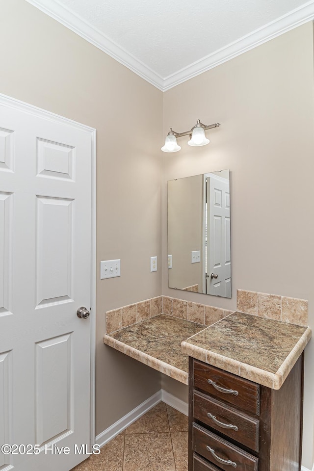 bathroom featuring tile patterned flooring and ornamental molding