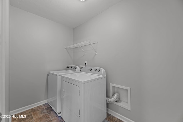 laundry area featuring separate washer and dryer