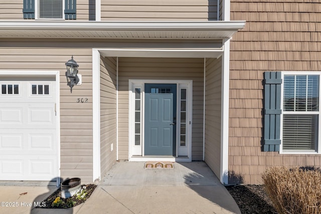 entrance to property with a garage