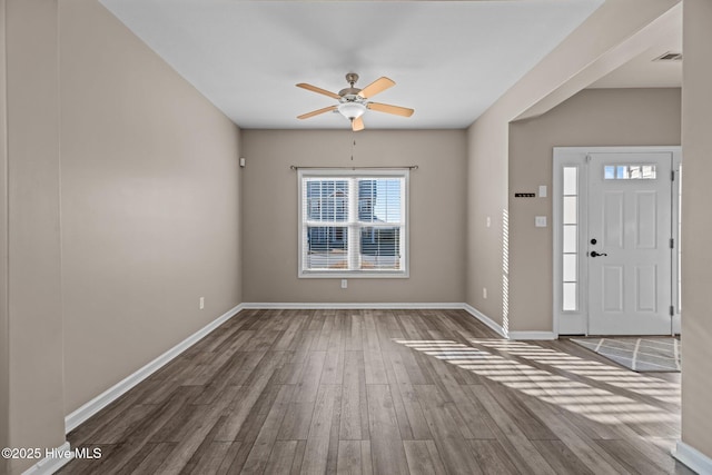 entrance foyer with hardwood / wood-style flooring and ceiling fan