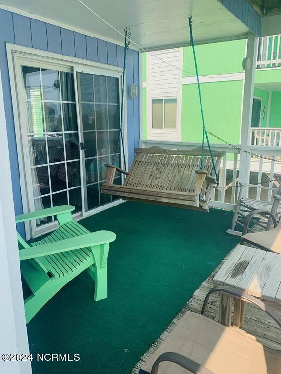 view of playground featuring a porch