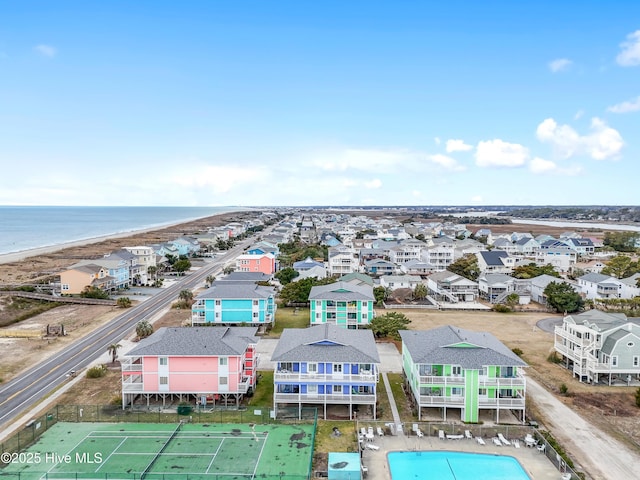 aerial view featuring a water view and a beach view