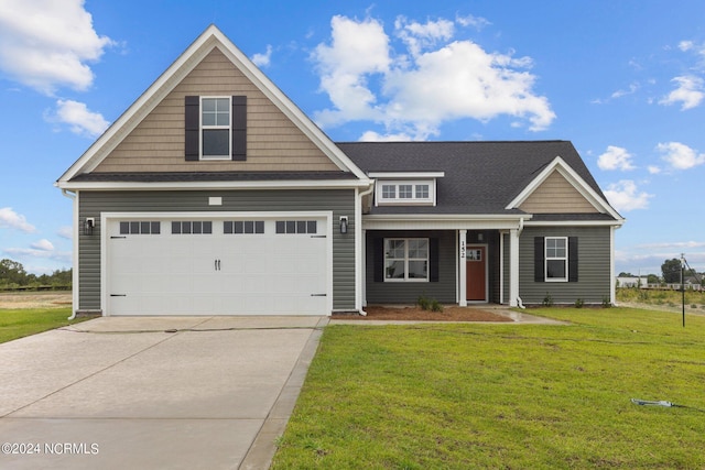 craftsman-style house with a front yard