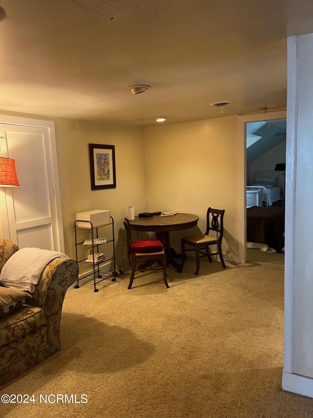 view of carpeted dining area