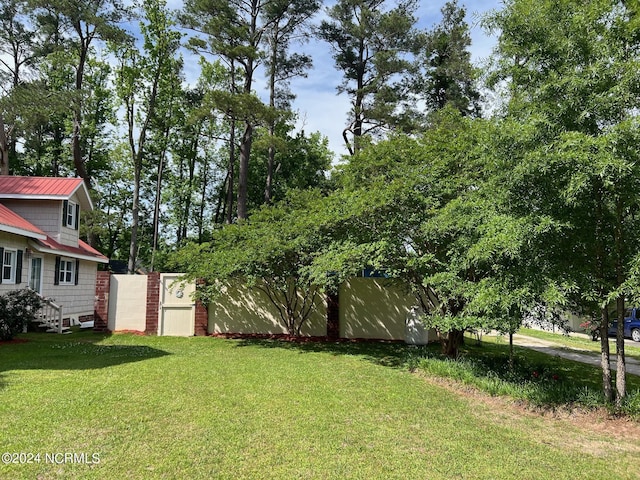 view of yard with fence