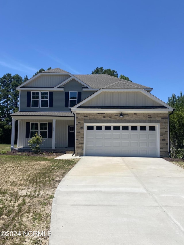 view of front of home with a garage