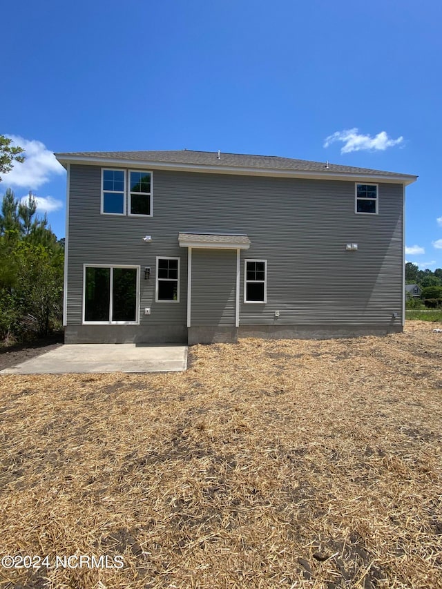 rear view of property with a patio