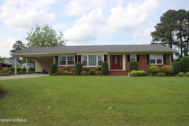 single story home with a carport and a front lawn