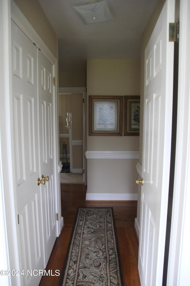 hall featuring wood-type flooring