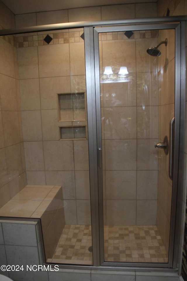 bathroom with walk in shower