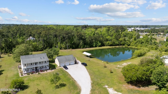 aerial view featuring a water view and a forest view