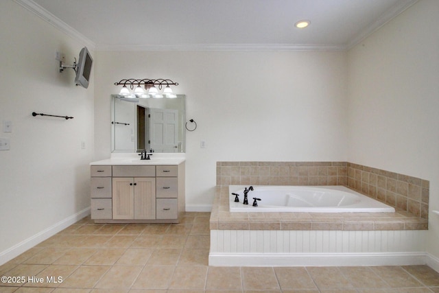 full bath with tiled bath, vanity, baseboards, ornamental molding, and tile patterned floors