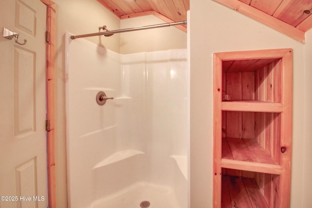 full bathroom featuring wood ceiling, vaulted ceiling, and a shower