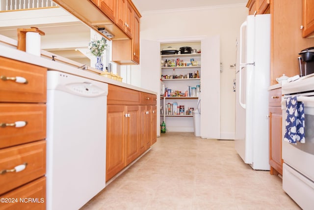 kitchen with white appliances, ornamental molding, light countertops, and brown cabinetry