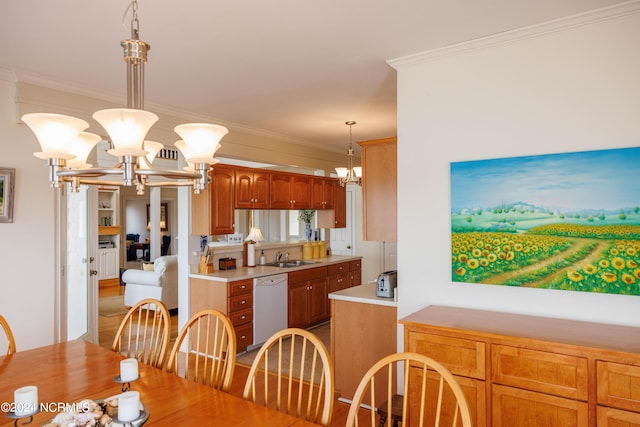 dining area with an inviting chandelier, crown molding, and wood finished floors