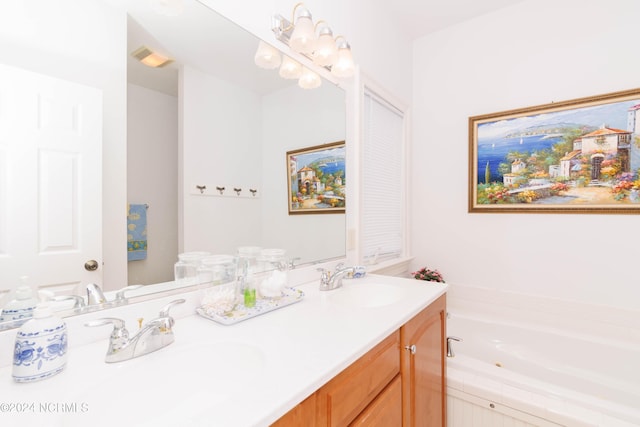 full bathroom featuring a bath, double vanity, and a sink