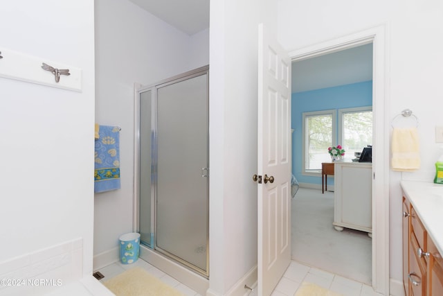 full bath featuring a stall shower and vanity