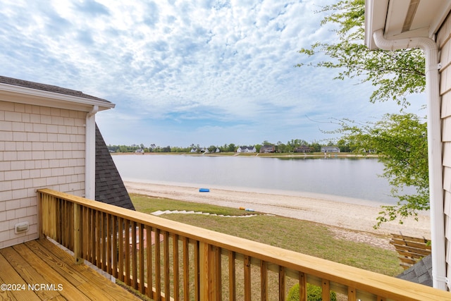 deck featuring a water view