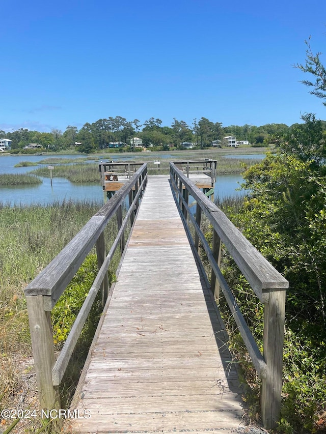 view of dock with a water view