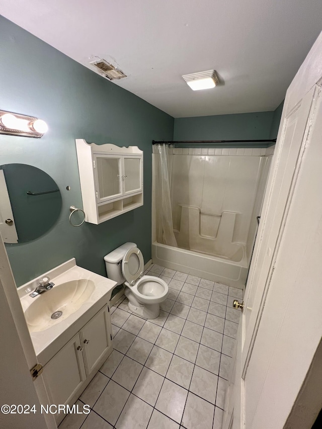 bathroom featuring visible vents, toilet, shower / tub combo, vanity, and tile patterned flooring