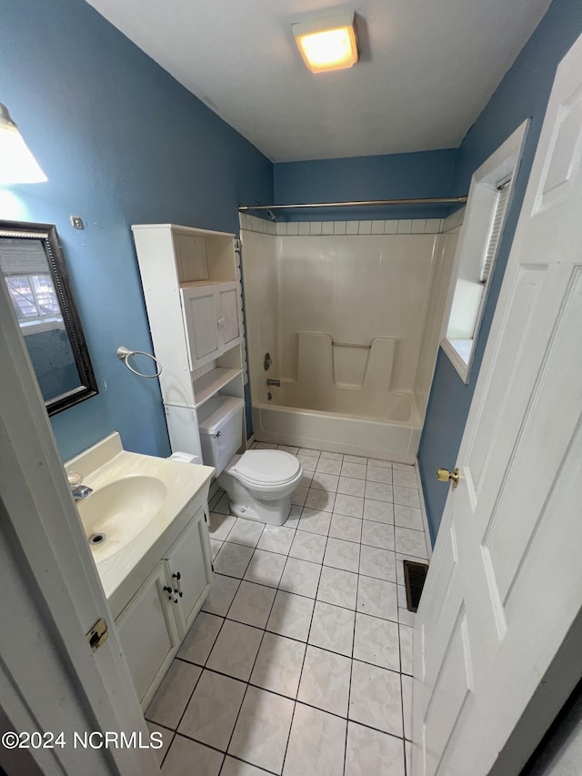 full bathroom featuring shower / bathing tub combination, tile patterned floors, toilet, and vanity