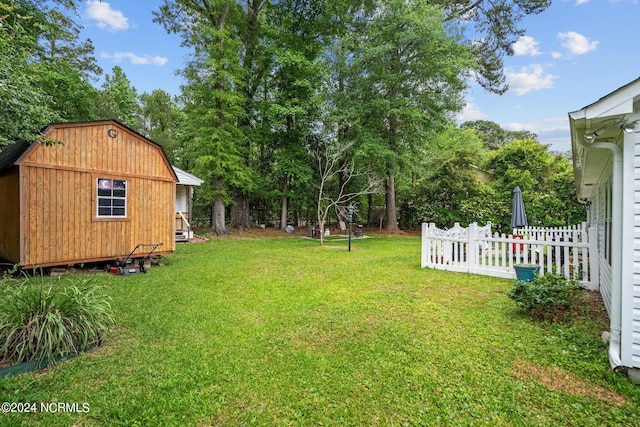 view of yard with a storage shed