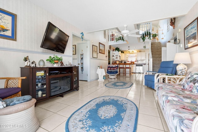 living room featuring tile flooring and ceiling fan