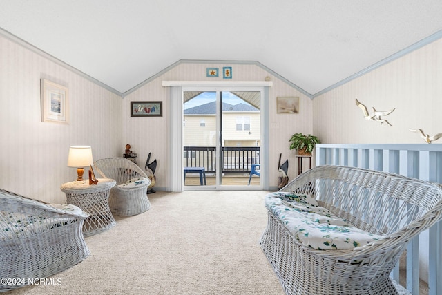 carpeted bedroom with ornamental molding, vaulted ceiling, and access to exterior