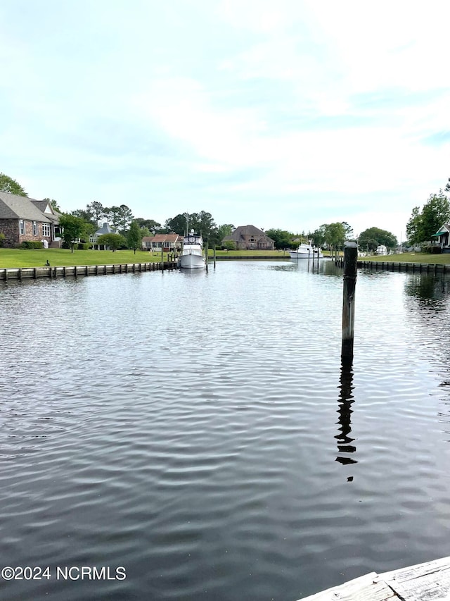 view of water feature with a boat dock