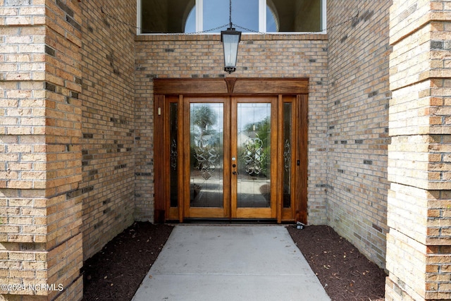 entrance to property featuring french doors