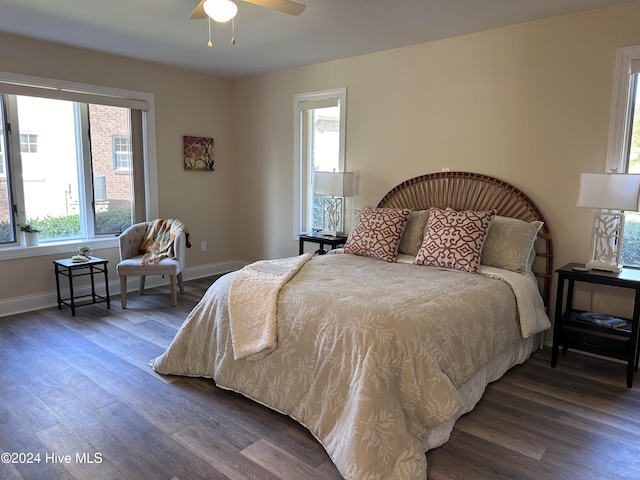 bedroom featuring dark wood-type flooring and ceiling fan