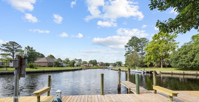 view of dock with a water view