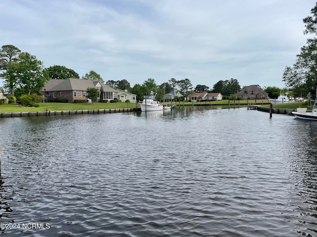 water view featuring a dock