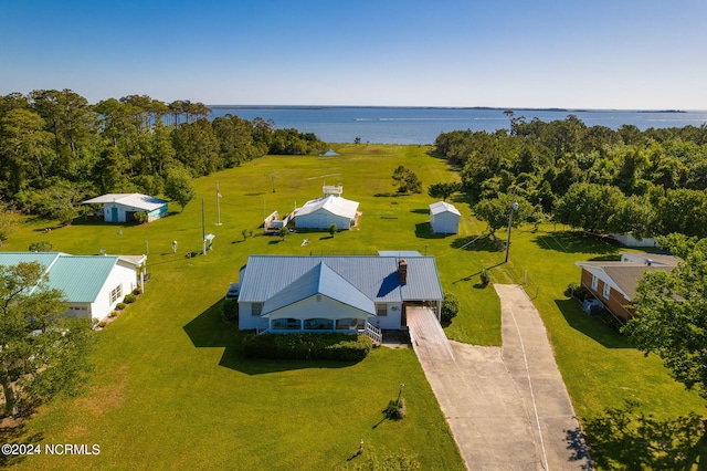 drone / aerial view with a water view