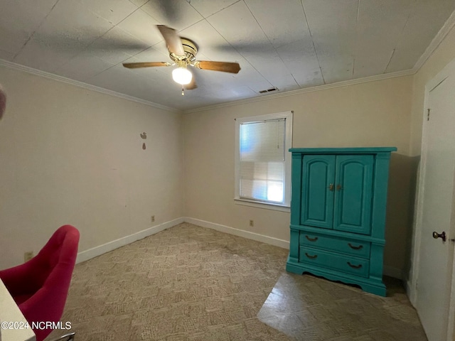 unfurnished bedroom featuring baseboards, visible vents, ornamental molding, and ceiling fan