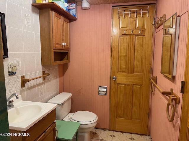 half bath with vanity and toilet