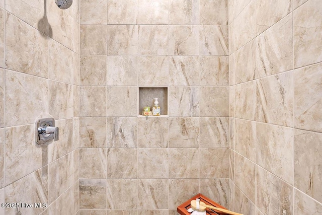 interior space featuring a tile shower