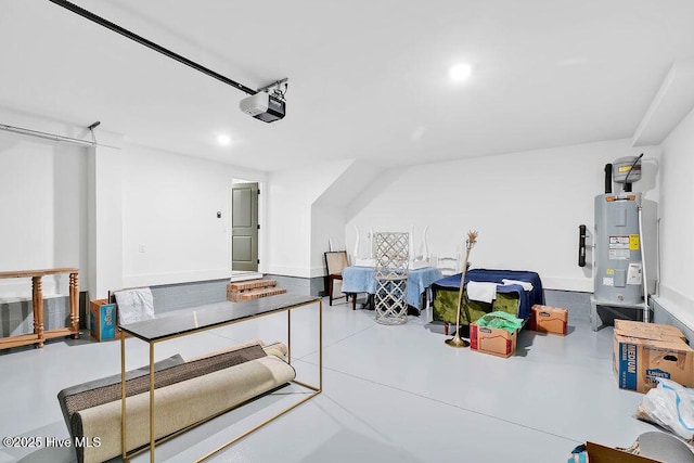 interior space with a garage door opener and water heater