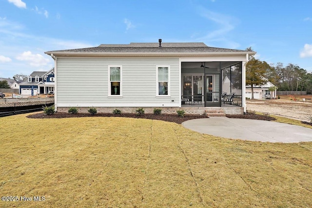 back of house featuring a sunroom, a yard, ceiling fan, and a patio area