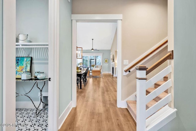 entryway featuring light hardwood / wood-style flooring and ceiling fan