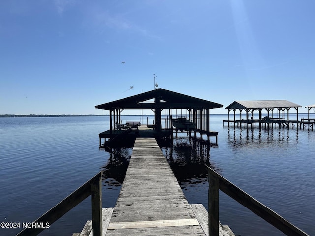 view of dock with a water view