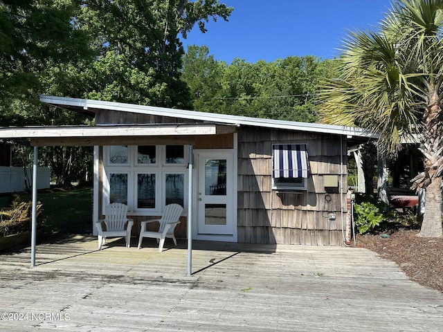 exterior space featuring a wooden deck