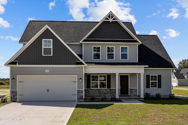 craftsman-style home featuring a porch, a garage, and a front lawn