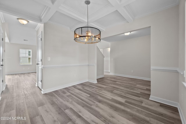 200 Slater Way, Jacksonville, NC 28540 - unfurnished dining area featuring coffered ceiling, wood finished floors, a chandelier, beam ceiling, and baseboards