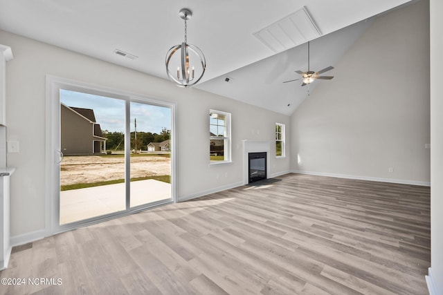 200 Slater Way, Jacksonville, NC 28540 - unfurnished living room featuring a glass covered fireplace, light wood-type flooring, a chandelier, baseboards, and high vaulted ceiling